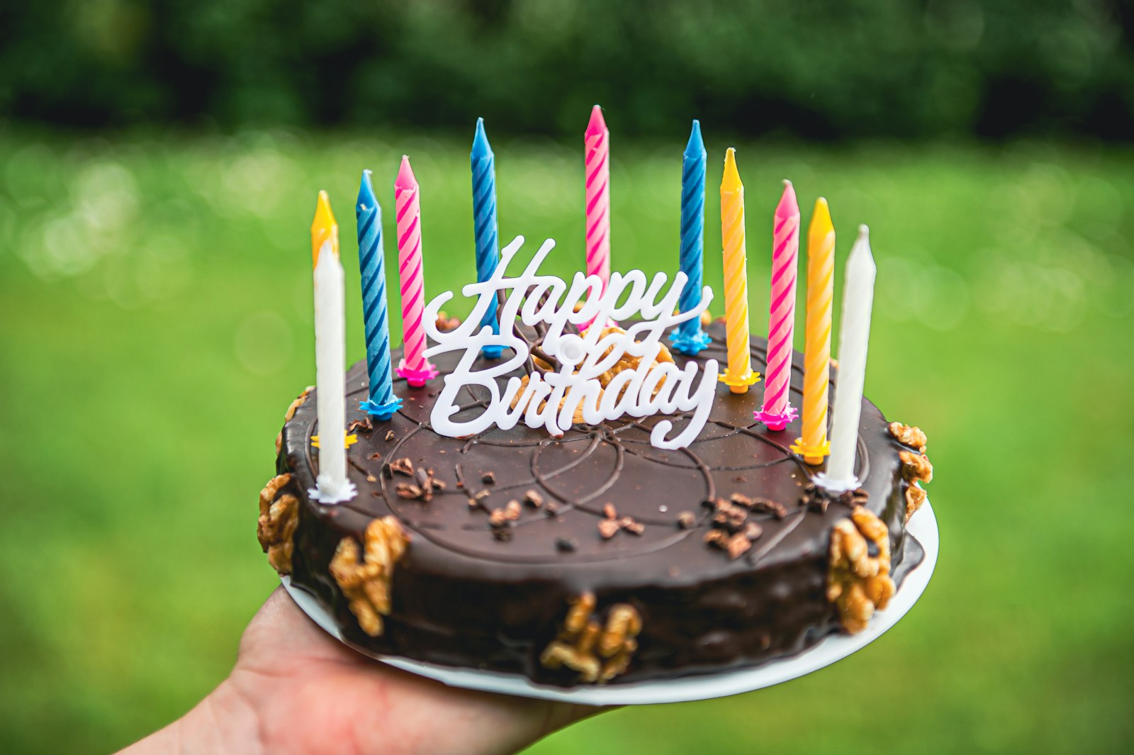 Birthday cake with lit candles