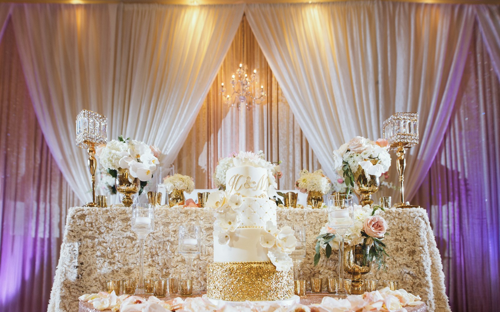Celebration cake displayed with flowers
